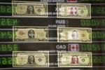 Poursuite de la hausse du dollar et volatilité en vue en 2015