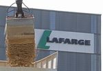 Lafarge optimiste pour 2015, fusion avec Holcim en bonne voie