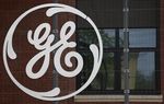GE relève son objectif de cessions d'actifs pour GE Capital