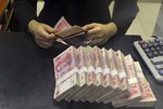 Marché : La Chine dévalue le yuan après des indicateurs décevants