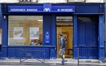 Axa boucle la vente d'activités au Royaume-Uni