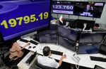 Tokyo : Tokyo finit stable, une séance freinée par le yen