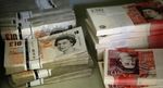 Marché : Le sterling chute après le vote UK, réaction limitée sur les Bourses